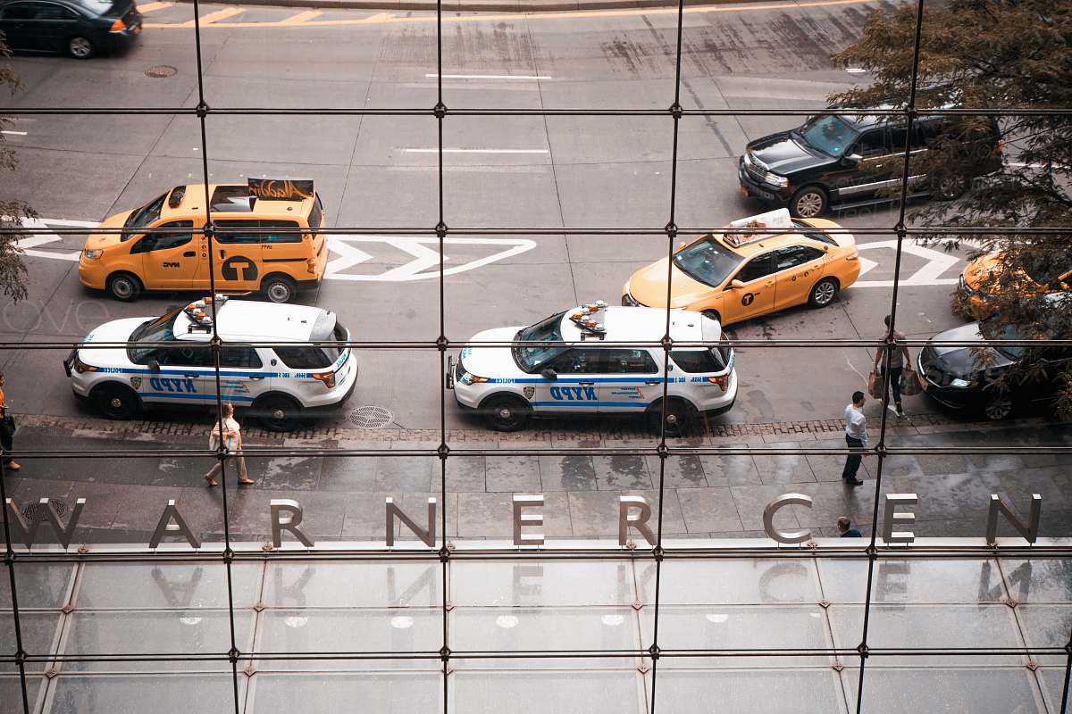 taxi two parked NYPD vehicles car